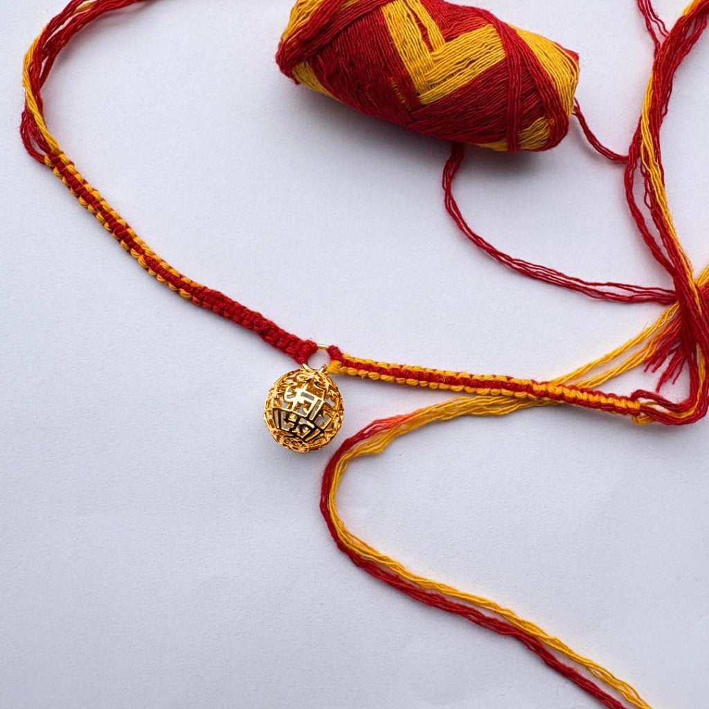 Rakhi Ganesha Shloka (Globe) Gold